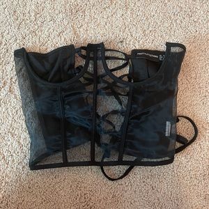 Corset type, mesh, ties on back with strings